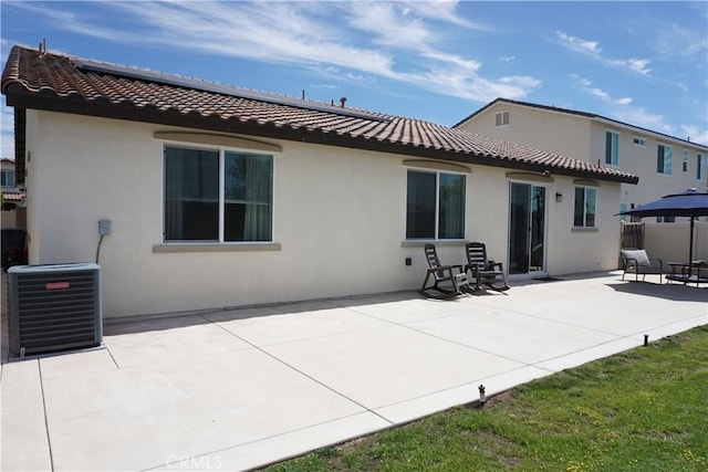 34539 Velvetleaf St, Winchester, CA 92596 - rear view of property featuring cooling unit, a tile roof, a patio, and stucco siding