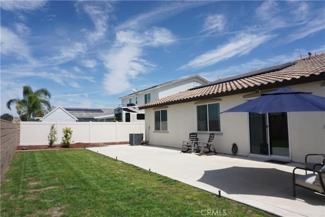 34539 Velvetleaf St, Winchester, CA 92596 - rear view of house featuring a tiled roof, stucco siding, a patio area, and central AC unit