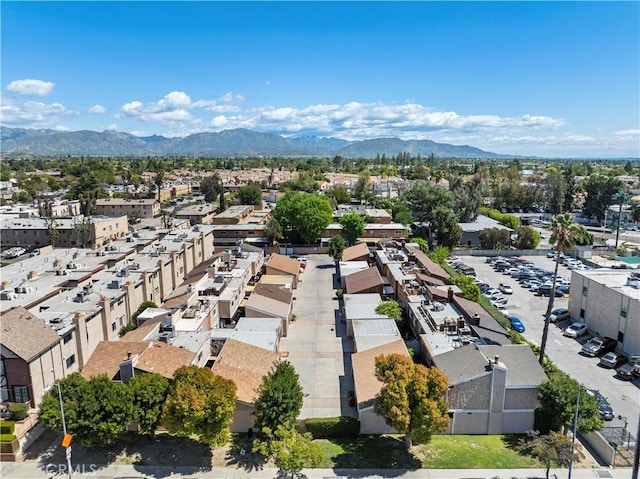 aerial view featuring a mountain view and a residential view