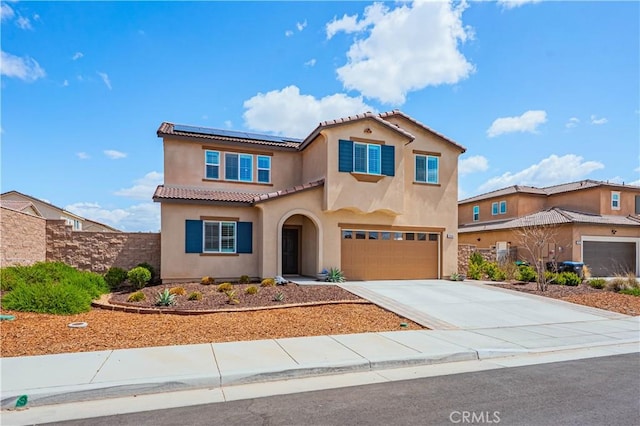 28340 Memory Ln, Winchester, CA 92596 - view of front of house featuring a tiled roof, solar panels, fence, a garage, and stucco siding