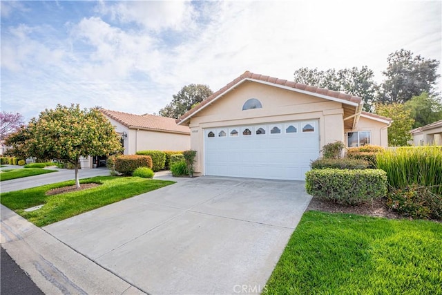 40108 Corte Lorca, Murrieta, CA 92562 - ranch-style house with concrete driveway, stucco siding, a garage, a tiled roof, and a front lawn