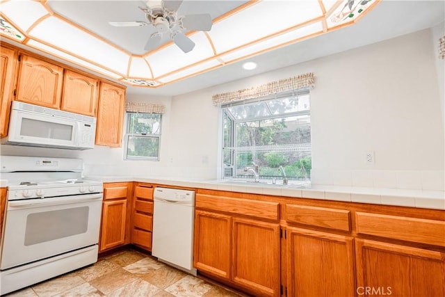 40108 Corte Lorca, Murrieta, CA 92562 - kitchen featuring white appliances, ceiling fan, recessed lighting, and brown cabinets