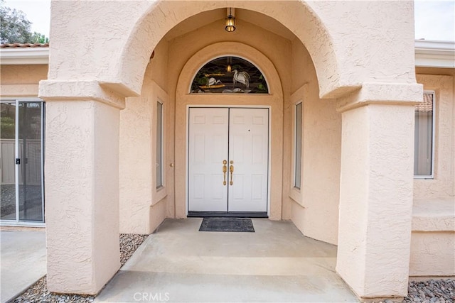 40108 Corte Lorca, Murrieta, CA 92562 - doorway to property with stucco siding and a tile roof
