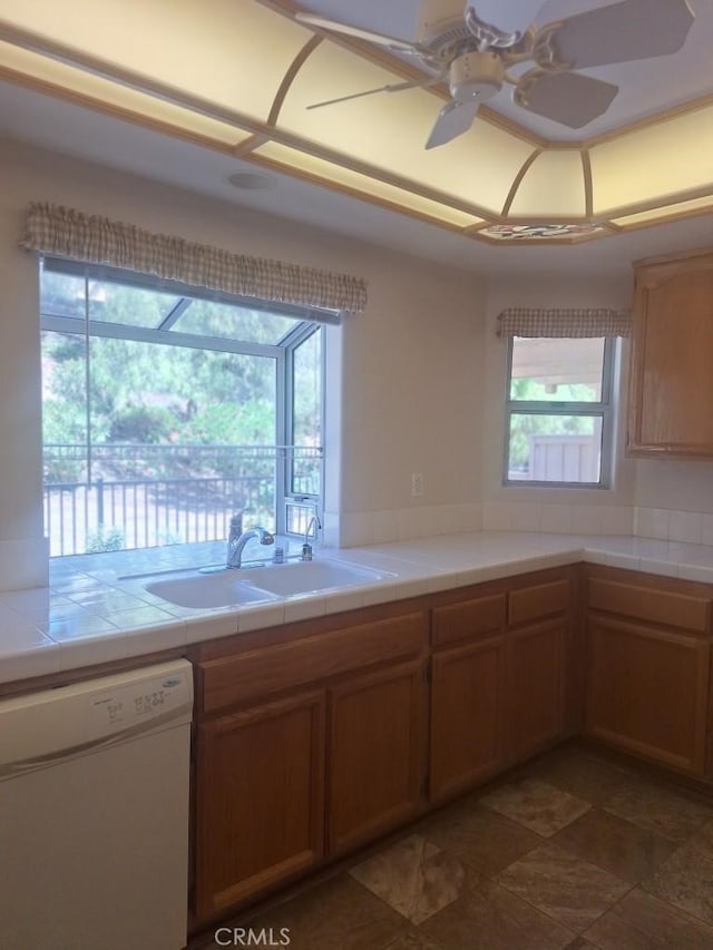 40108 Corte Lorca, Murrieta, CA 92562 - kitchen with white dishwasher, a ceiling fan, and tile countertops