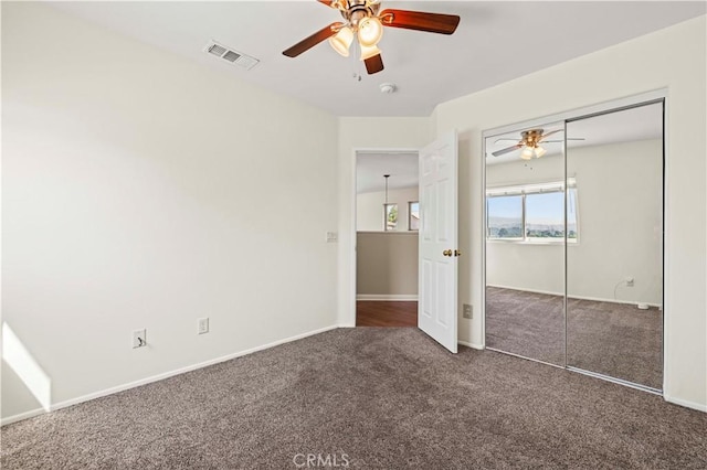 25302 Rolling Greens Way, Saugus, CA 91350 - unfurnished bedroom with carpet flooring, a closet, baseboards, and a ceiling fan