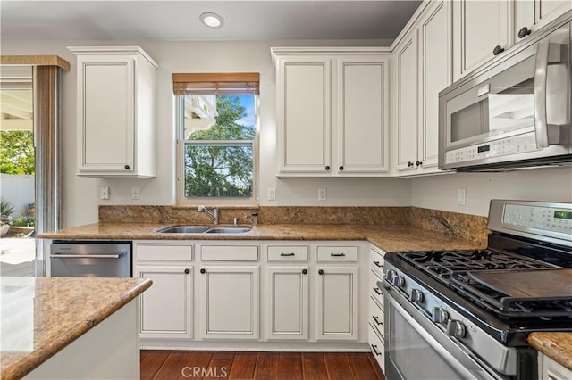 25302 Rolling Greens Way, Saugus, CA 91350 - kitchen featuring stainless steel appliances, a sink, recessed lighting, healthy amount of natural light, and white cabinetry