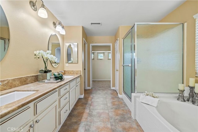 25302 Rolling Greens Way, Saugus, CA 91350 - bathroom featuring a stall shower, double vanity, a bath, and tile patterned floors