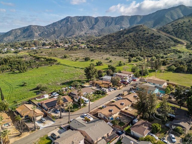 aerial view featuring a residential view and a mountain view