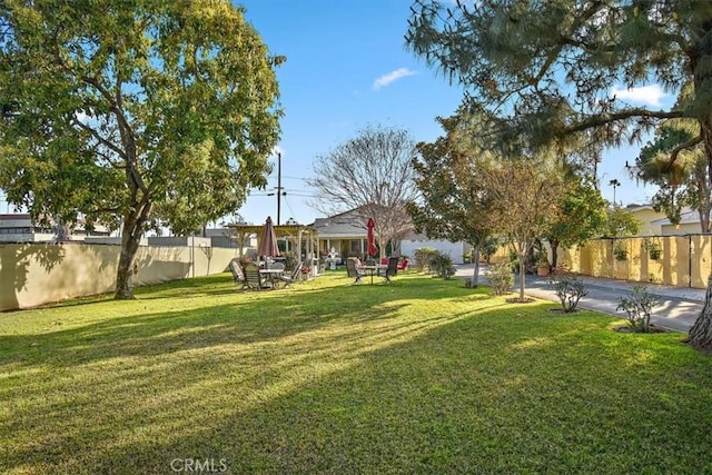 view of yard with fence