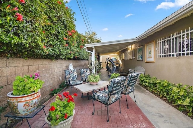 view of patio / terrace with fence