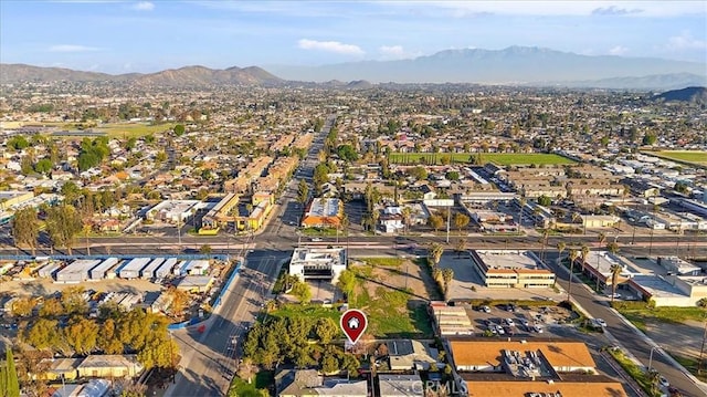 aerial view featuring a mountain view and a residential view