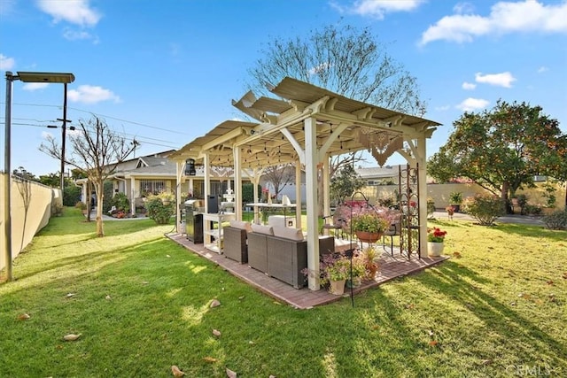 view of yard with a fenced backyard, a gazebo, and an outdoor living space