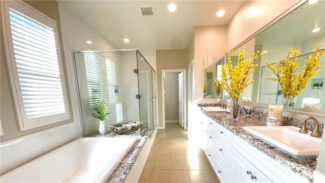 105 Tinker, Irvine, CA 92618 - bathroom with a stall shower, a bath, double vanity, tile patterned flooring, and recessed lighting