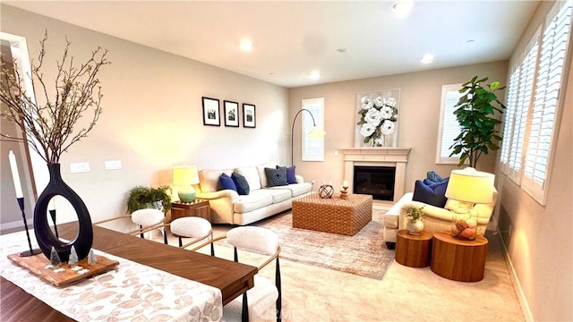 105 Tinker, Irvine, CA 92618 - living area with plenty of natural light, baseboards, a glass covered fireplace, and recessed lighting