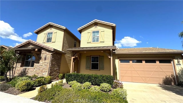 105 Tinker, Irvine, CA 92618 - traditional-style home featuring an attached garage, concrete driveway, and stone siding