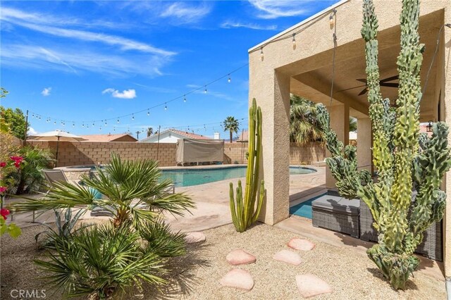 43475 Brahea Ct, Indio, CA 92201 - view of pool featuring an in-ground hot tub, a fenced backyard, and a patio