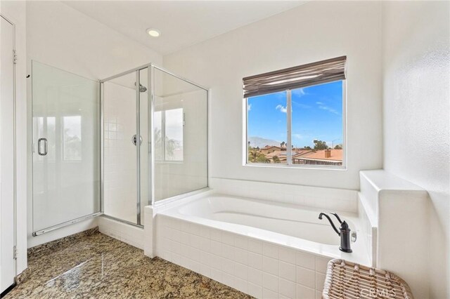 43475 Brahea Ct, Indio, CA 92201 - full bathroom featuring a stall shower and a garden tub