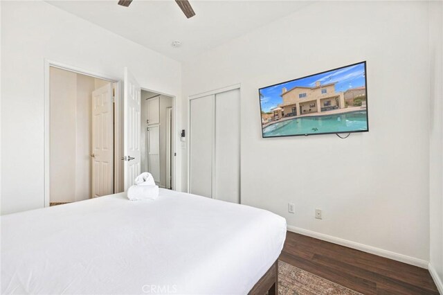 43475 Brahea Ct, Indio, CA 92201 - bedroom with wood finished floors, baseboards, a closet, and a ceiling fan