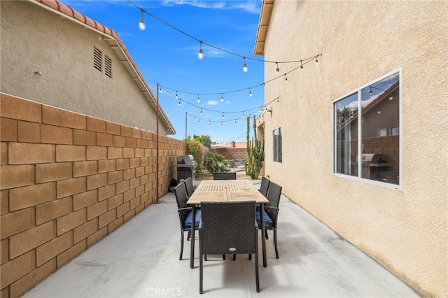 43475 Brahea Ct, Indio, CA 92201 - fenced backyard featuring a patio area, grilling area, and outdoor dining area