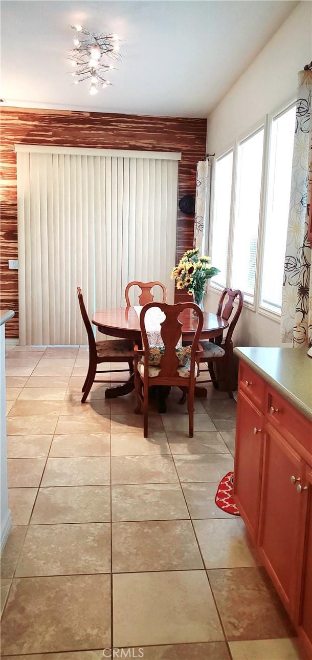dining room featuring light tile patterned flooring