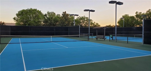 view of sport court with fence and community basketball court