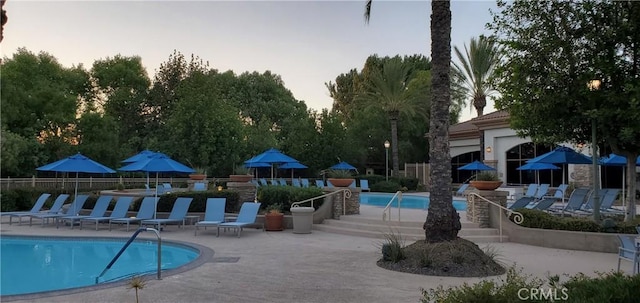 pool featuring a patio area