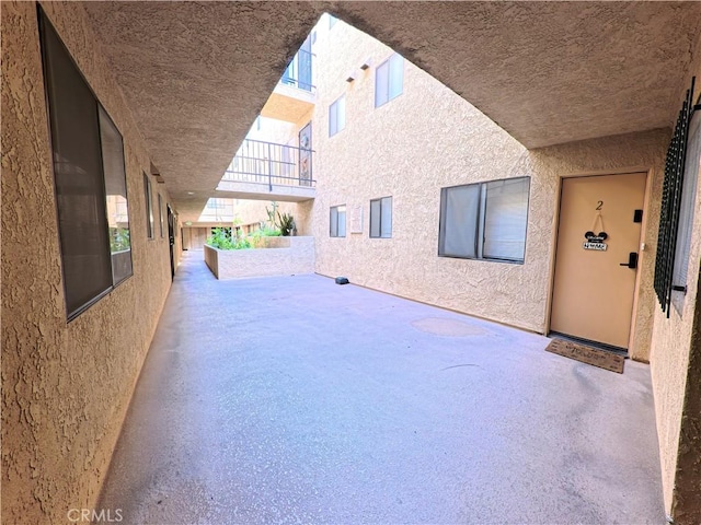view of patio with a balcony