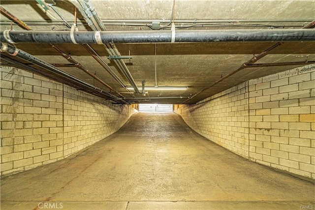 basement featuring concrete block wall