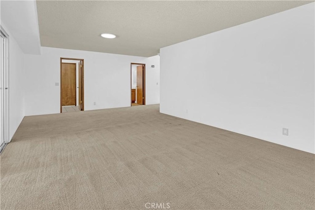 7650 Cristobal Ave, Atascadero, CA 93422 - unfurnished room with carpet floors, a textured ceiling, and recessed lighting