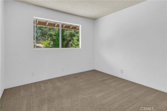 7650 Cristobal Ave, Atascadero, CA 93422 - carpeted spare room featuring a textured ceiling