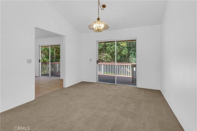 7650 Cristobal Ave, Atascadero, CA 93422 - unfurnished room featuring carpet flooring, a chandelier, and lofted ceiling