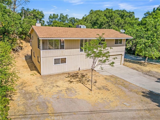 7650 Cristobal Ave, Atascadero, CA 93422 - ranch-style house featuring a chimney and driveway