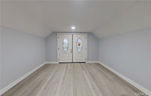 805 Earlham St, Pasadena, CA 91101 - foyer featuring light wood-style flooring, baseboards, and vaulted ceiling