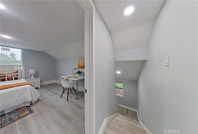 805 Earlham St, Pasadena, CA 91101 - bedroom featuring baseboards, vaulted ceiling, and light wood-type flooring