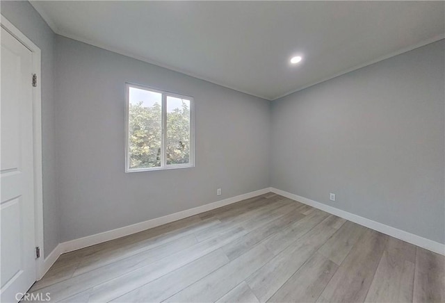 805 Earlham St, Pasadena, CA 91101 - unfurnished room with light wood-style flooring, baseboards, and recessed lighting