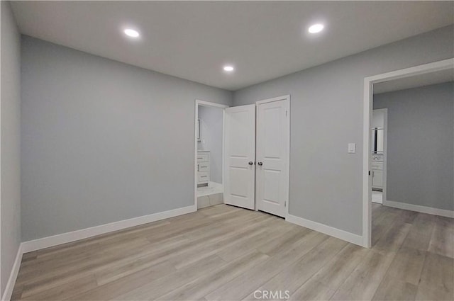 805 Earlham St, Pasadena, CA 91101 - unfurnished bedroom featuring baseboards, a closet, recessed lighting, and light wood finished floors