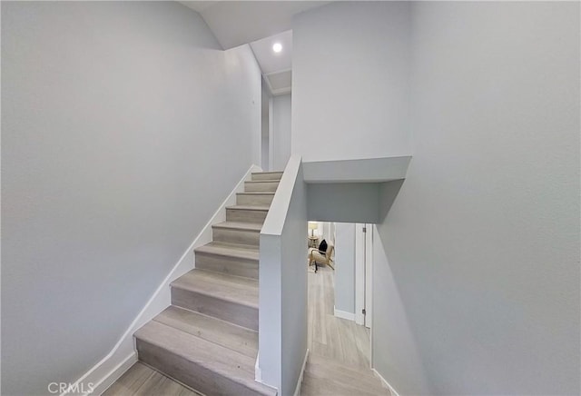 805 Earlham St, Pasadena, CA 91101 - stairs featuring baseboards and wood finished floors