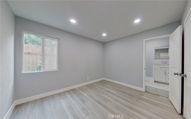 805 Earlham St, Pasadena, CA 91101 - unfurnished room featuring baseboards, light wood-style flooring, and recessed lighting