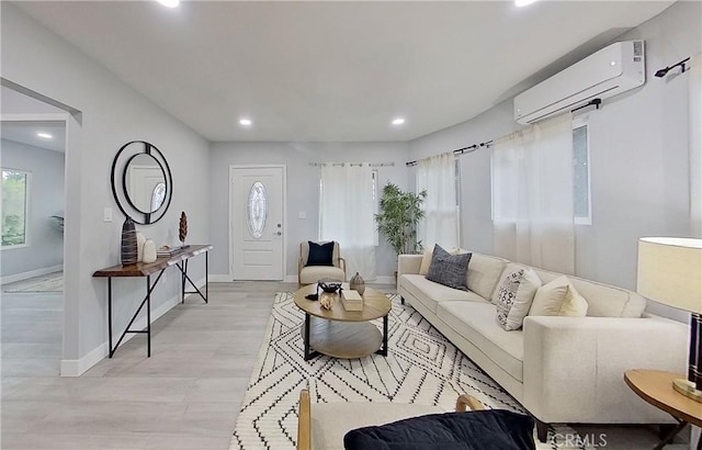 805 Earlham St, Pasadena, CA 91101 - living area featuring baseboards, a wall mounted AC, recessed lighting, and light wood-type flooring
