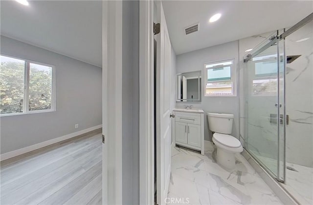 805 Earlham St, Pasadena, CA 91101 - full bathroom with visible vents, baseboards, a marble finish shower, toilet, and vanity