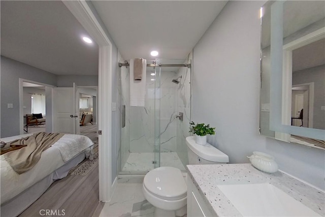 805 Earlham St, Pasadena, CA 91101 - bathroom featuring marble finish floor, toilet, a marble finish shower, and ensuite bath