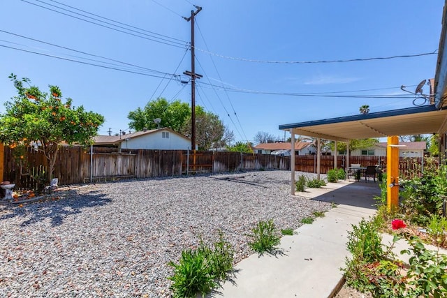 view of yard with a patio and a fenced backyard
