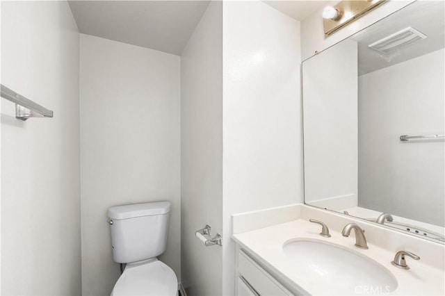 19231 Sherman Way Unit 44, Reseda, CA 91335 - half bathroom with toilet, vanity, and visible vents