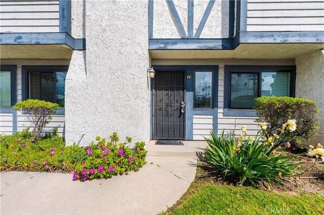19231 Sherman Way Unit 44, Reseda, CA 91335 - property entrance featuring stucco siding