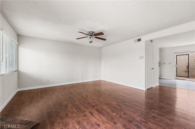 19231 Sherman Way Unit 44, Reseda, CA 91335 - spare room with a textured ceiling, visible vents, baseboards, ceiling fan, and wood finished floors