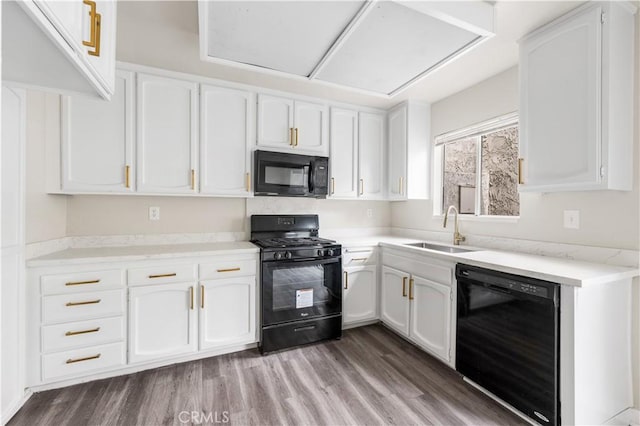 19231 Sherman Way Unit 44, Reseda, CA 91335 - kitchen featuring black appliances, a sink, and white cabinets