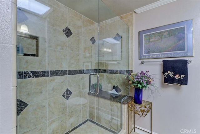 full bathroom with a stall shower and ornamental molding