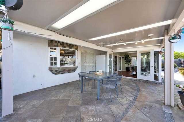 view of patio featuring outdoor dining space