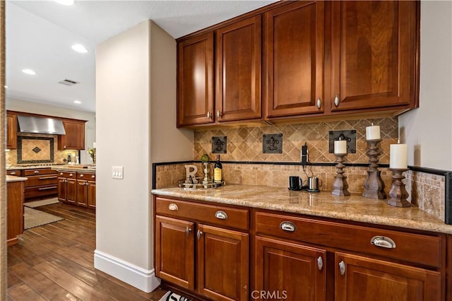 38925 Cherry Point Ln, Murrieta, CA 92563 - bar featuring dark wood finished floors, recessed lighting, backsplash, visible vents, and wall chimney exhaust hood