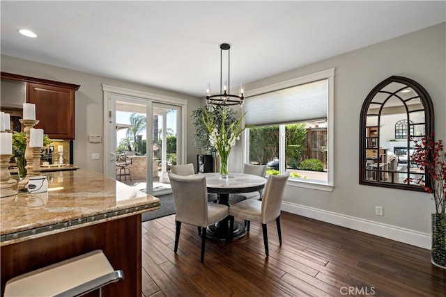 38925 Cherry Point Ln, Murrieta, CA 92563 - dining room with an inviting chandelier, plenty of natural light, dark wood finished floors, and baseboards